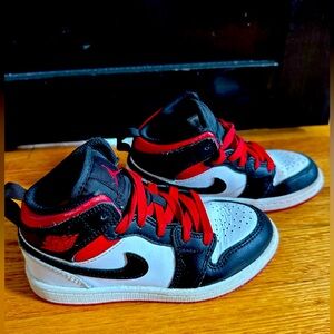 Kids Nike Jordans size 12. Like new condition. Red, white, black.